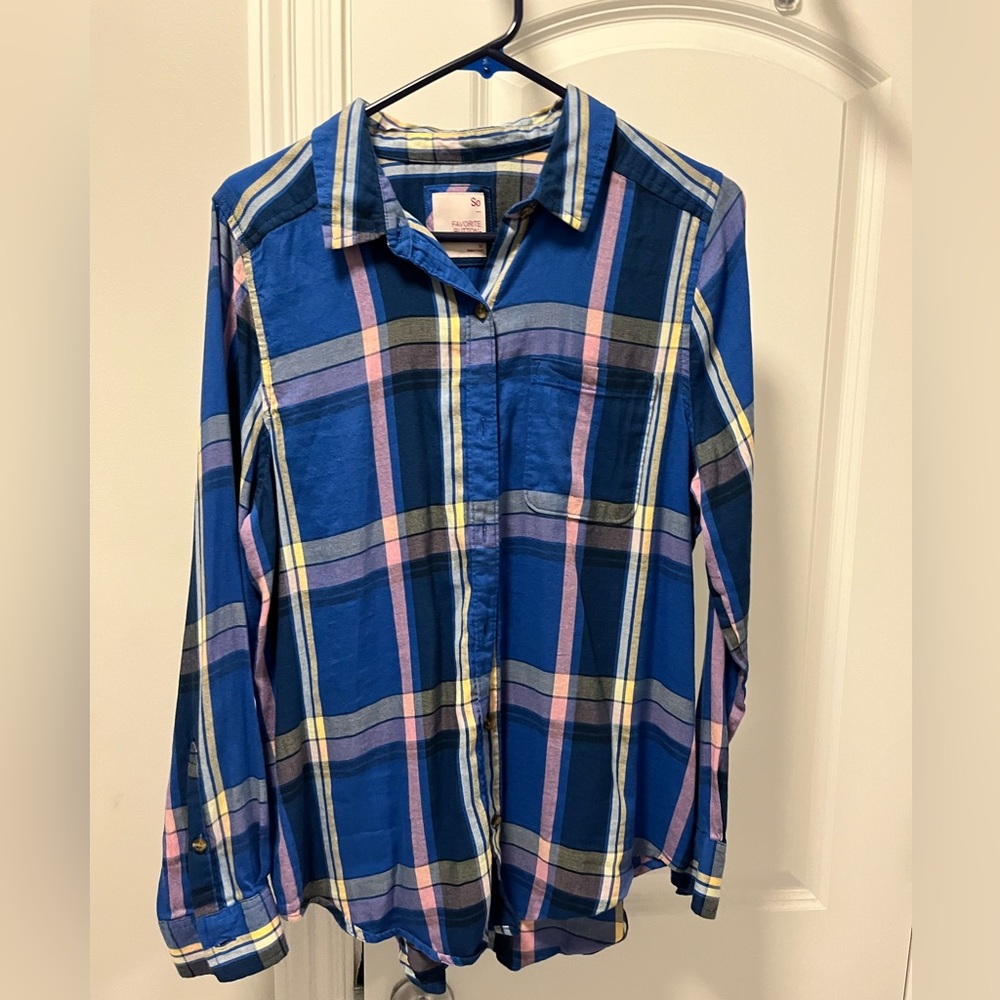 So button-up women’s plaid top.